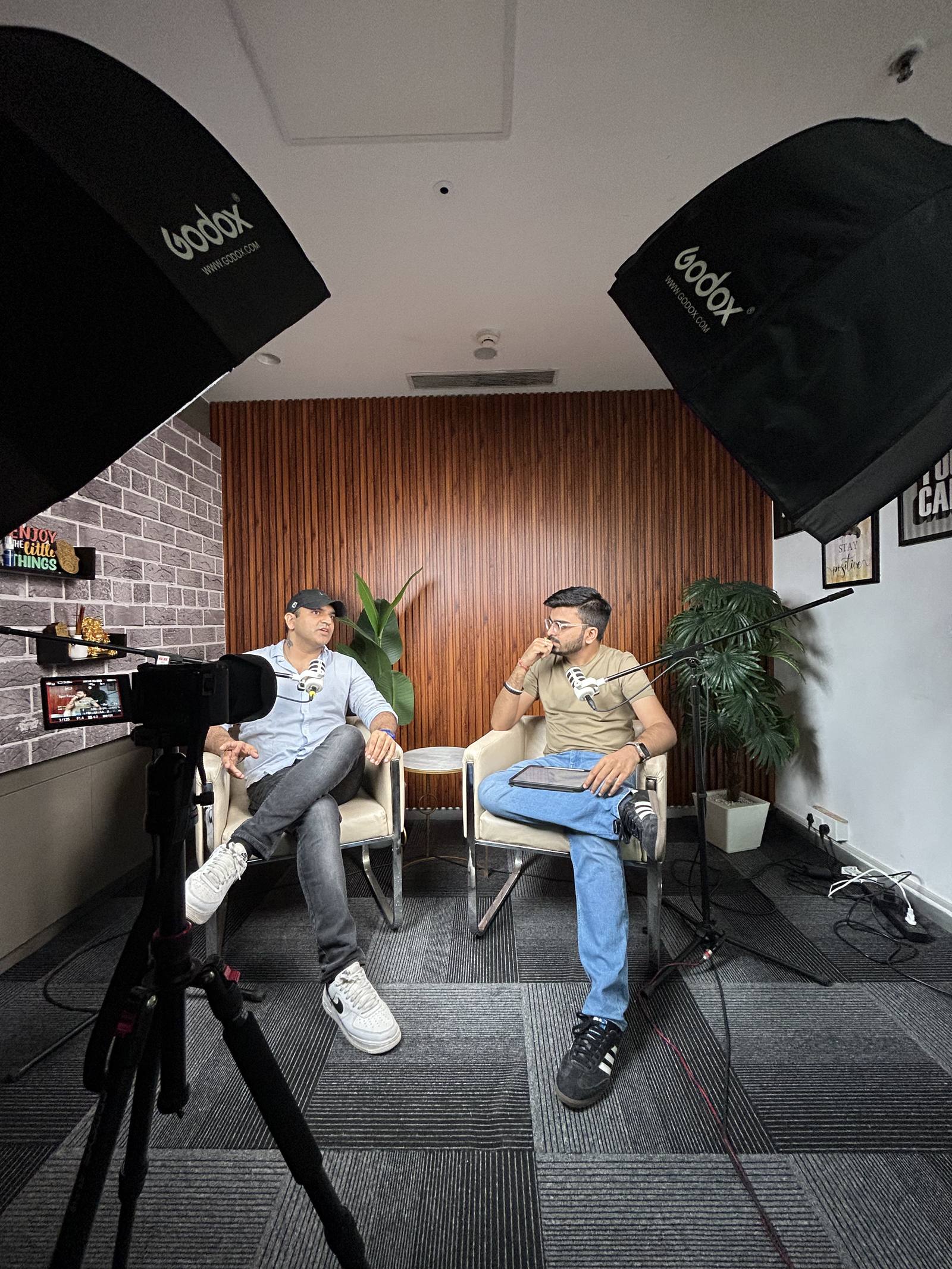 Two-person podcast interview being recorded at KAP Digital Studios, podcast studio in Gurgaon